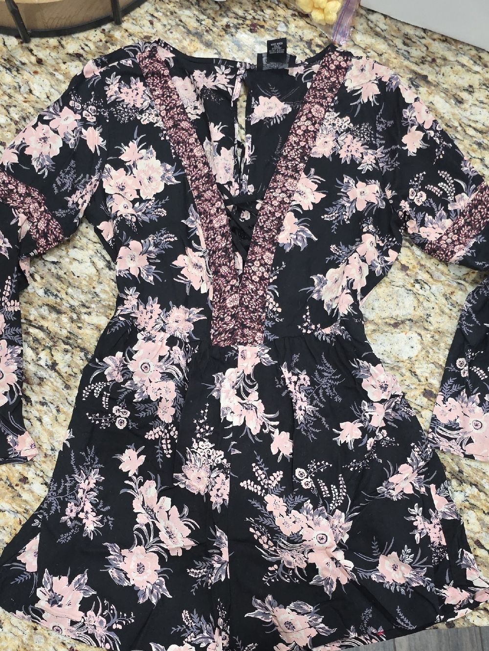 Angie Black Floral V-Neck Romper with Blush Accents